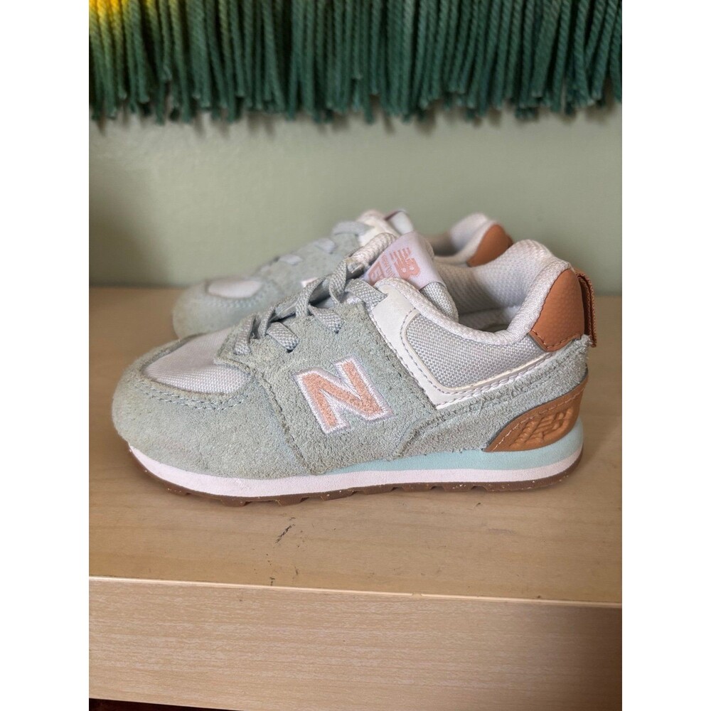 New Balance Kids Sneakers in Light Sage Green with Pink Accents and Tan Heel